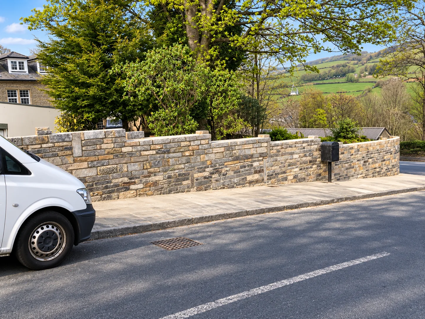 Stone boundary wall — ALB Construction project photograph